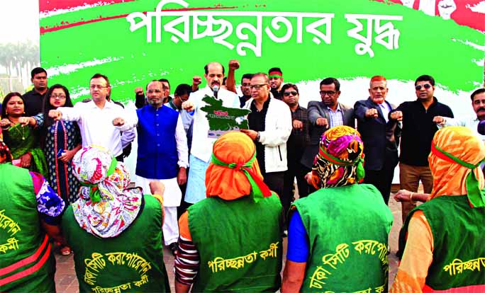 Housing and Public Works Minister SM Rejaul Karim, among others, at a programme on 'Cleanliness Campaign' organised by Dhaka North City Corporation in the city's Manik Mia Avenue on Friday.