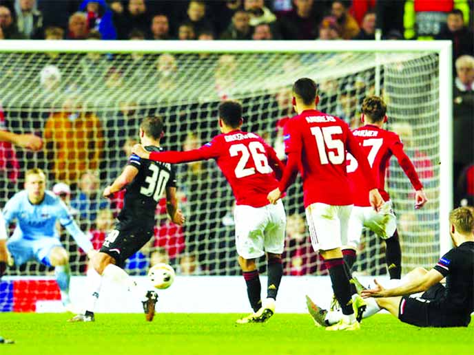 Manchester United's Mason Greenwood scores his side's second goal during the Europa League soccer match between Manchester United and AZ Alkmaar on Thursday.