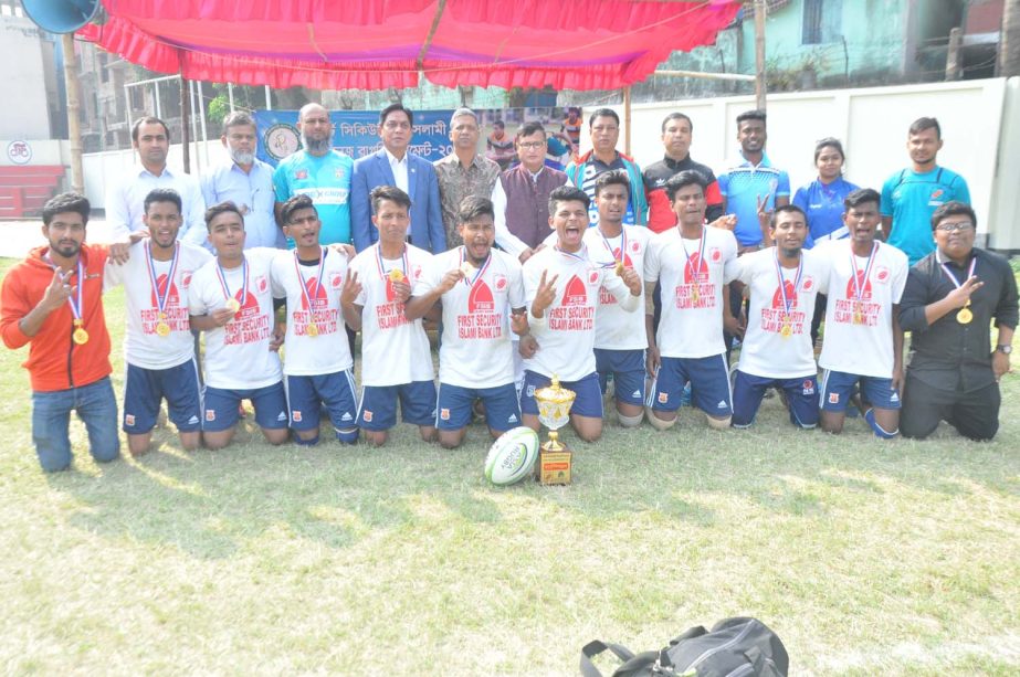 Players of RCCI Public School and College of Rangpur, the champions in the First Security Islami Bank Under-20 Men's College Rugby Competition with the guests and officials of Bangladesh Rugby Union pose for photograph at Physical Education College Groun