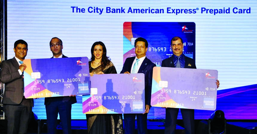 Aziz Al Kaiser, Chairman of City Bank Limited, unveiling the new initiatives of American Express marking its ten year celebration ceremony with the bank at a hotel in the city on Friday. Mashrur Arefin, CEO of the bank and Divya Jain, Vice President and B