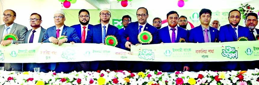 Md. Mahbub ul Alam, CEO of Islami Bank Bangladesh Limited, inaugurating its 354th branch at Kalamia Bazar of Bakalia in Chattogram on Sunday. Mohammed Monirul Moula, Muhammad Qaisar Ali, AMDs, Hasne Alam, Md. Abdul Jabbar, Md. Saleh Iqbal, DMDs, Mohammed