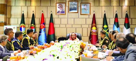 Prime Minister Sheikh Hasina presiding over the 17th joint governing body meeting of the National Defence College and Defence Services Command and Staff College (DSCSC) in Mirpur cantonment on Sunday. ISPR photo