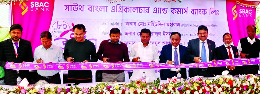Md. Mohiuddin Moharaj, Chairman of Pirojpur Zila Parishad, inaugurating the 80th branch of South Bangla Agriculture & Commerce (SBAC) Bank Limited at Bhandaria in Pirojpur on Tuesday as chief guest. Md. Golam Faruque, CEO of the bank and local elites were