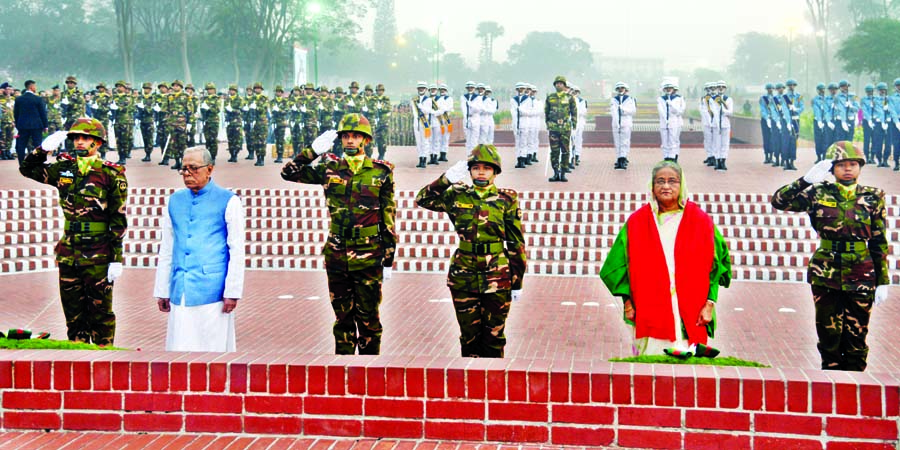 President Abdul Hamid and Prime Minister Sheikh Hasina stood in solemn silence at the National Mausoleum in Savar paying tribute to the war heroes on 49th Victory Day on Monday. PID photo