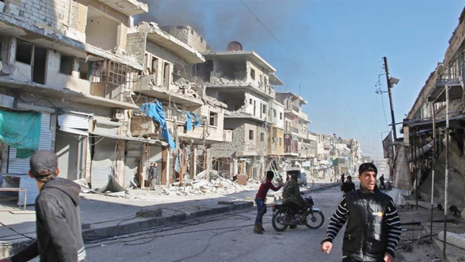 Smoke billows from a building following a reported bombardment by pro-Syrian government forces in the town of Maarat el-Numan in Syria's Idlib province on Friday.