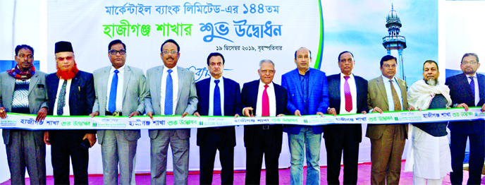 Lawmaker Morshed Alam, Chairman of Mercantile Bank Limited, inaugurating the bank's 144th branch by cutting ribbon at Hajiganj in Chandpur on Thursday. Bank's Managing Director Md Quamrul Islam Chowdhury, Vice Chairman Akram Hossain (Humayun), Directors