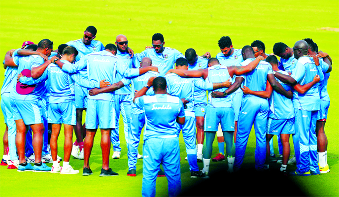 West Indies' cricket team attend a training session ahead of their third one-day cricket match against India, in Cuttack, India on Saturday.