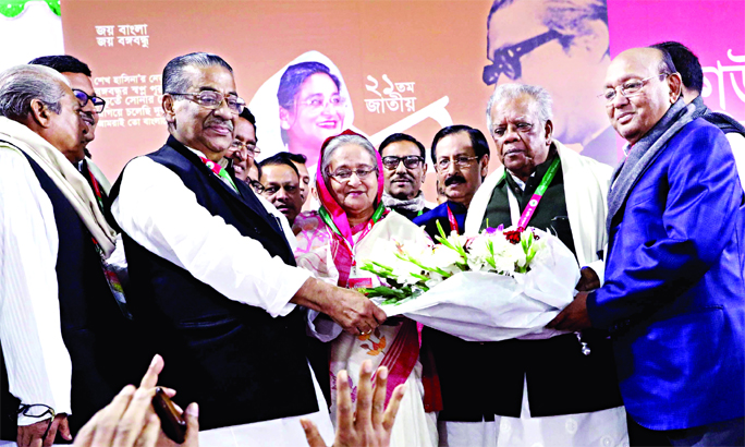 Senior leaders of Bangladesh Awami League (AL) greet Prime Minister Sheikh Hasina after she was re-elected the party's President for ninth term on Saturday.