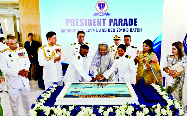 Prime Minister Sheikh Hasina cutting cake marking the President Parade 2019 of the passing out cadets of 'Midshipman-2017 AAlfa' and 'Direct Entry Officer-2019 bravo' courses arranged by the Bangladesh Naval Academy at the parade ground of the Bangla