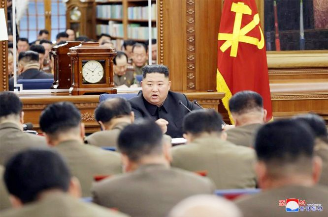 North Korean leader Kim Jong Un speaks during the Third Enlarged Meeting of the Seventh Central Military Commission of the Workers' Party of Korea.