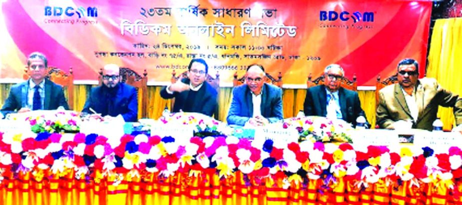 Wahidul Haque Siddiqui, Chairman of BDCOM Online Limited, presiding over its 23rd at a convention hall in the city on Tuesday. The AGM declared 6 per cent cash and 6 per cent stock dividend for the year ended 30th June 2019. S M Golam Faruk Alamgir, Manag