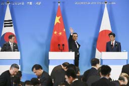 Chinese Premier Li Keqiang hosts the leaders of Japan and South Korea, with their nations focused on North Korea's nuclear ambitions.