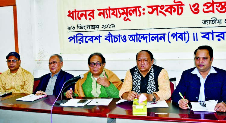 Chairman of Save The Environment Movement Abu Naser Khan speaking at a seminar on 'Fair Price of Paddy: Crisis and Proposals' at the Jatiya Press Club on Thursday.