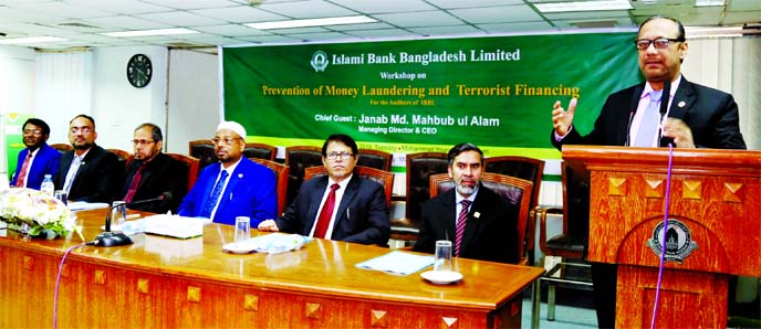 Md. Mahbub ul Alam, Managing Director of Islami Bank Bangladesh Limited (IBBL), addressing at a workshop on "Prevention of Money Laundering & Terrorist Financing" at the bank's head office in the city recently. Abu Reza Md. Yeahia, DMD and other high o