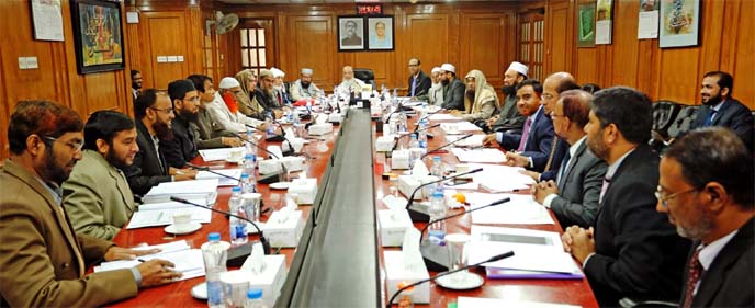 Sheikh Mohammad Qutubuddin, Chairman of Shari`ah Supervisory Committee of Islami Bank Bangladesh Limited, presiding over its meeting at the bank's head office in the city recently. Md. Mahbub ul Alam, CEO of the bank and Dr. Mohammad Abdus Samad, Member