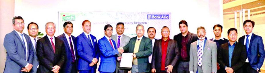 Md. Arfan Ali, President & Managing Director of Bank Asia Ltd and Md Safiqul Islam, Managing Director of SME Foundation, exchanging documents after signing an agreement at Bank Asia Tower at Karwan Bazar in the city recently. As per the deal, the bank, a