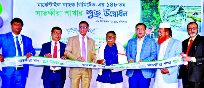 Monsur Ahmed, President of Bangladesh Awami League of Satkhira District, inaugurating the 148th branch of Mercantile Bank Limited in Satkhira on Sunday. Bank's Deputy Managing Director Md Zakir Hossain, Satkhira Chamber of Commerce & Industry President N