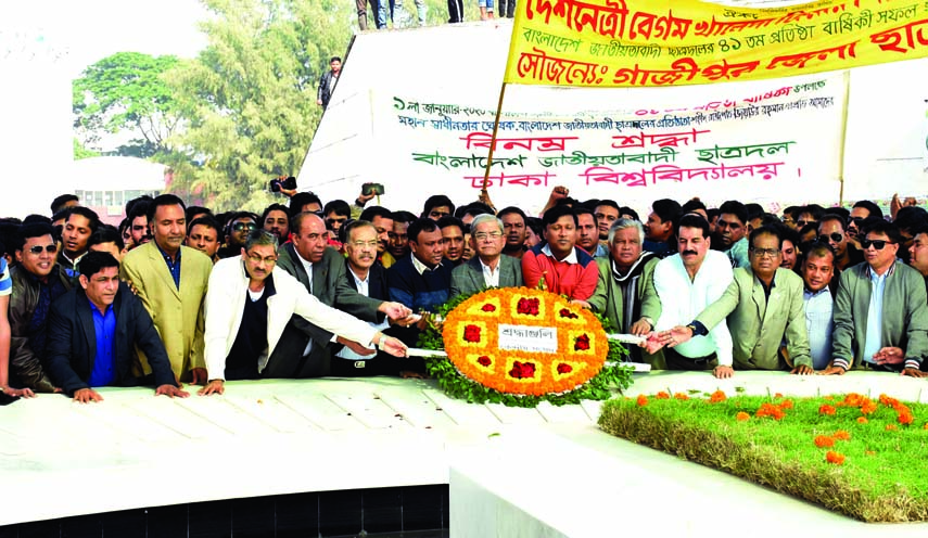 BNP Secretary General Mirza Fakhrul Islam Alamgir along with party colleagues placing floral wreaths at the mazar of former President Ziaur Rahman in the city on Tuesday marking founding anniversary of Jatiyatabadi Chhatra Dal.