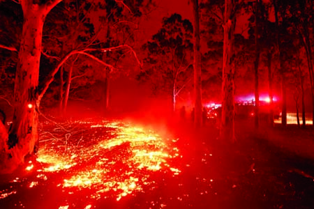 Everything turns red as bushfires continue to rage in Mallacoota, Victoria, Australia. Internet photo