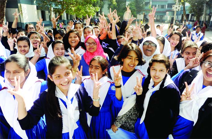 BOGURA: Students of Government Girls' High School showing V-sign after obtaining GPA-5 in PSC and JSC Examination results published on Tuesday.