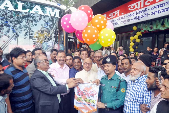CCC Mayor AJM Nasir Uddin inaugurating S Alam Bus service from City Cinema Palace to Potiya by cutting ribbon at Cinema Palace premises yesterday.