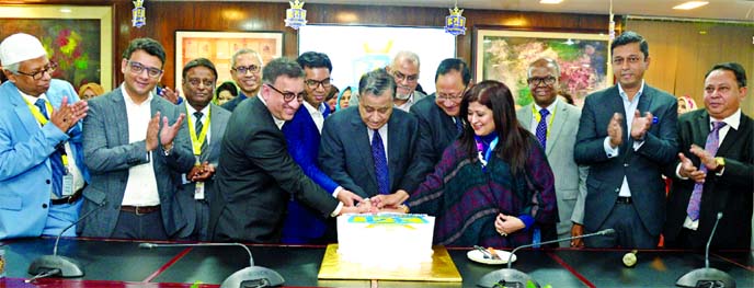 Farzana Chowdhury, Managing Director along with Nasir A. Choudhury, founding Managing Director and Advisor of Green Delta Insurance Company Limited, celebrating its 34th founding anniversary through cutting a cake at its head office in the city on Wednesd