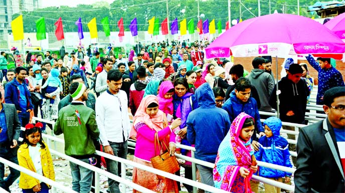 A large number of visitors thronged the month-long Dhaka International Trade Fair (DITF)-2020, in the city's Sher-e-Bangla Nagar area on Friday to buy various products ignoring rain.