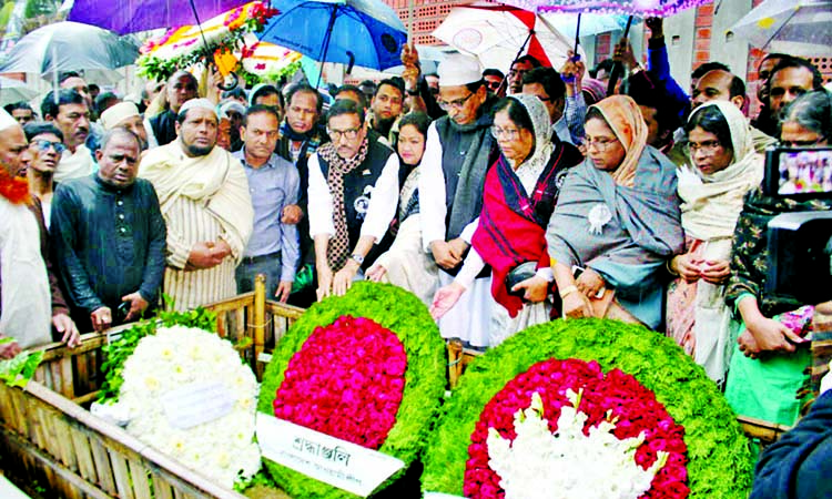 General Secretary of Awami League and Road Transport and Bridges Minister Obaidul Quader along with party colleagues paid tributes to former General Secretary of AL late Syed Ashraful Islam placing floral wreaths at his grave in the city's Banani on Frid