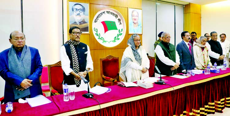 Prime Minister Sheikh Hasina along with party colleagues stands in solemn silence commemorating Bangabandhu and his martyred family members, liberation war martyred and four national leaders at the beginning of joint meeting of Awami League Central Execut