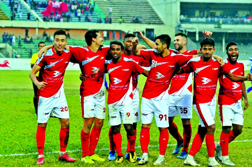 Players of Bashundhara Kings celebrating after defeating Bangladesh Police by three goals to nil in their semi-final match of the Federation Cup Football at the Bangabandhu National Stadium on Friday.