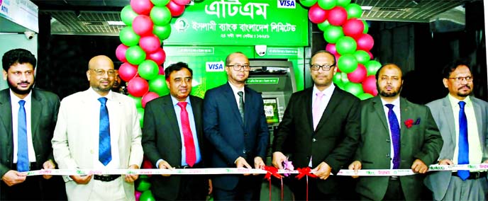 Md. Mahbub ul Alam, Managing Director of Islami Bank Bangladesh Limited, inaugurating Cash Recycling Machine (CRM) at city's Bashundhara City Shopping Complex recently. Mohammed Monirul Moula, Muhammad Qaisar Ali, AMDs, and Abu Reza Md. Yeahia, DMD of th