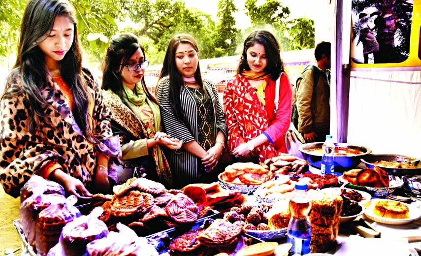 A 3-day long Poush Cake Festival began at Bangla Academy in the city yesterday .