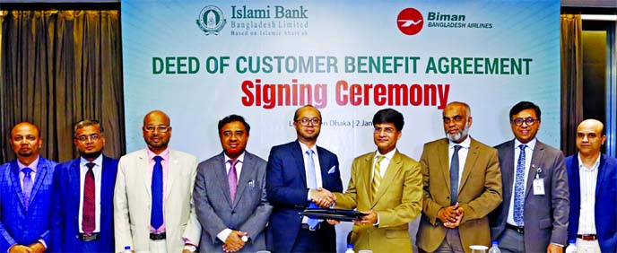 Md. Mokabbir Hossain, Managing Director and CEO of Biman Bangladesh Airlines and Mohammed Monirul Moula, AMD of Islami Bank Bangladesh Limited (IBBL), exchanging the 'Customer Benefit Agreement' signing document at a hotel in the city recently. Under th