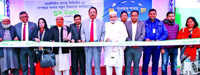 Md Shahjahan Hossain, Chairman of Sapahar Upzilla Parishad of Naogaon, inaugurating the "Sapahar shifted branch" of Mercantile Bank Limited at Sapahar New Market by cutting ribbon as chief guest on Sunday. Md. Quamrul Islam Chowdhury, CEO of the bank an