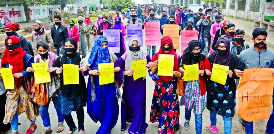 Students of Dhaka University bring out rallies on the campus for the second consecutive day on Tuesday, protesting the rape of one of their fellow students in Kurmitola on Airport Road Sunday night.