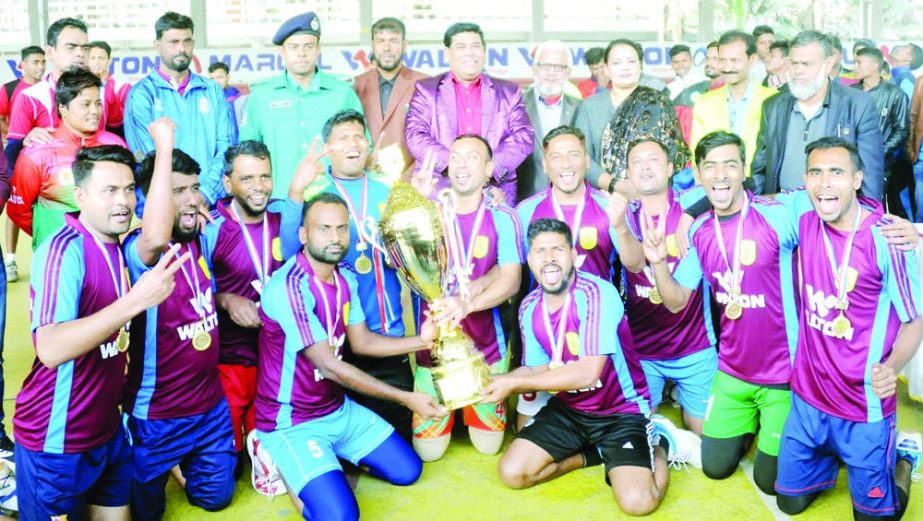 Members of Bangladesh Police team, the champions in the Walton Refrigerator Open Dewball (Men's) Championship with the guests and officials of Bangladesh Dewball Association pose for photograph at the Sheikh Russel Roller Skating Complex on Wednesday.