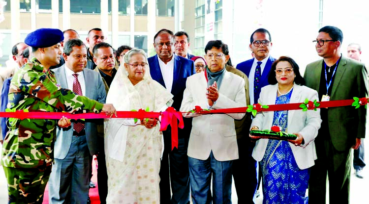 Prime Minister Sheikh Hasina inaugurating Multiple Textiles Fair cutting ribbon at Bangabandhu International Conference Center in the city on Thursday on the occasion of National Textiles Day. BSS photo