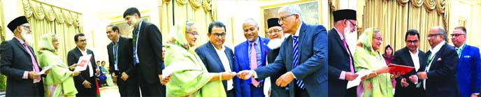 Different private banks donated money to "Father of the Nation Bangabandhu Sheikh Mujibur Rahman Memorial Trust"" to celebrate 100th Birth Anniversary of Bangabandhu at a function at Ganabhaban in the capital on Tuesday. Prime Minister Sheikh Hasina is s"