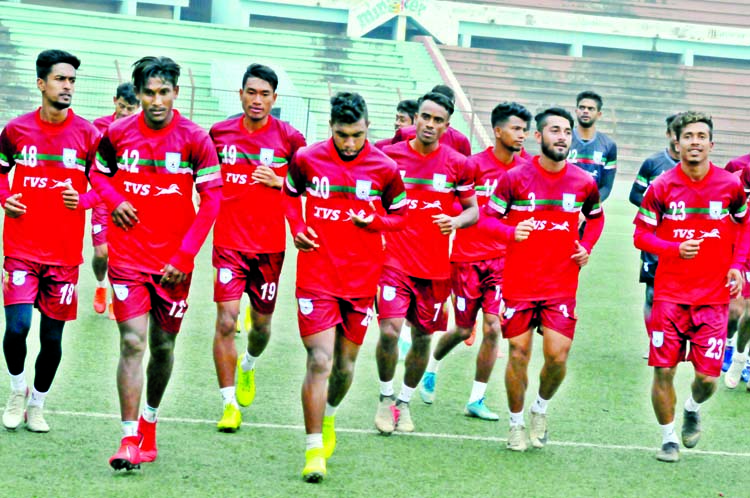Members of Bangladesh National Football team taking part at their practice session in the Bir Shreshtha Shaheed Sepoy Mohammad Mostafa Kamal Stadium of Kamalapur on Thursday.