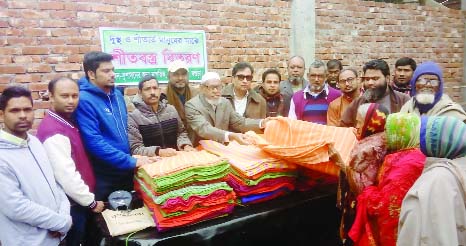 BOGURA: Winter clothes were distributed among the cold-hits at KG Institutes in Pirgachha Upazila organised by SUJAN on Tuesday.