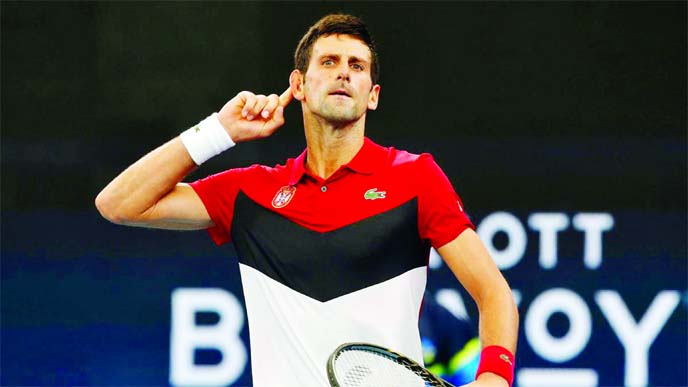 Novak Djokovic celebrates after beating Denis Shapovalov at the ATP Cup in Sydney on Friday.