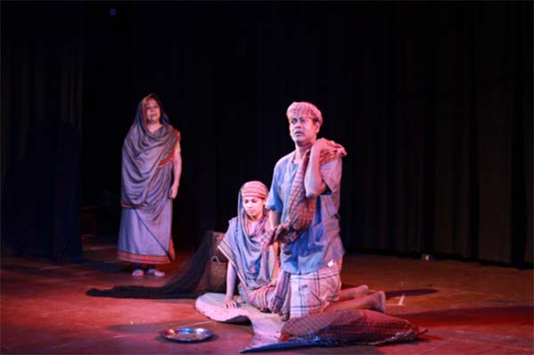 A view of drama scene of ' Jaal Natak' staged at Shilpakala Academy Auditorium arranged by Bangladesh Institute of Theatre Arts ( BITA), Chattogram on Thursday.