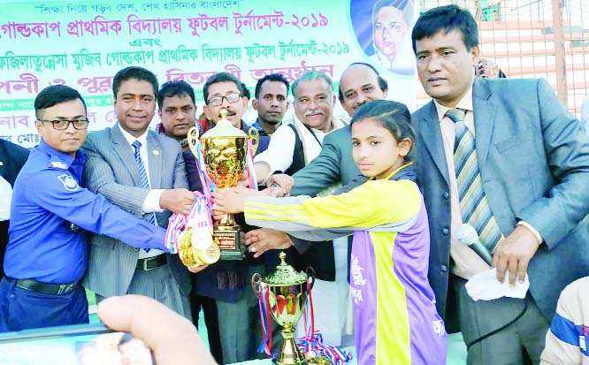 SHARIATPUR: Iqbal Hossain Opu MP distributing prizes among the winners of Bangabandhu and Bangamata Primary Football Gold Cup Tournament at Shariatpur District Stadium as Chief Guest recently.