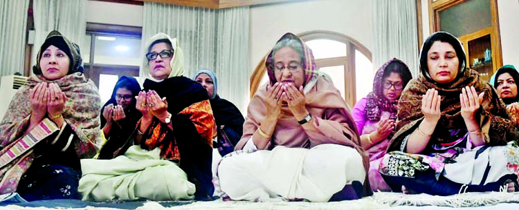 Prime Minister Sheikh Hasina joined Akheri Munajat (final prayers) of the 1st phase of Bishwa Ijtema from Ganabhaban residence yesterday morning. She was accompanied by her younger sister Sheikh Rehana. Photo : BSS