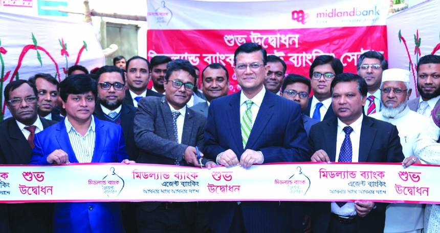 Md. Ahsan-uz Zaman, CEO of MIDLAND BANK Limited, inaugurating its Agent Banking Centre at city's ECB Chattar in Matikata in Dhaka Cantonment recently. High officials of the bank and local elites were also present.