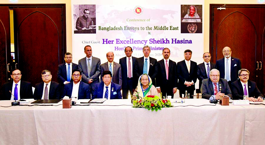 Prime Minister Sheikh Hasina poses for a photo session with the Bangladesh envoys to the Middle East at Shangri-la Hotel in Abu Dhabi on Monday. PID photo