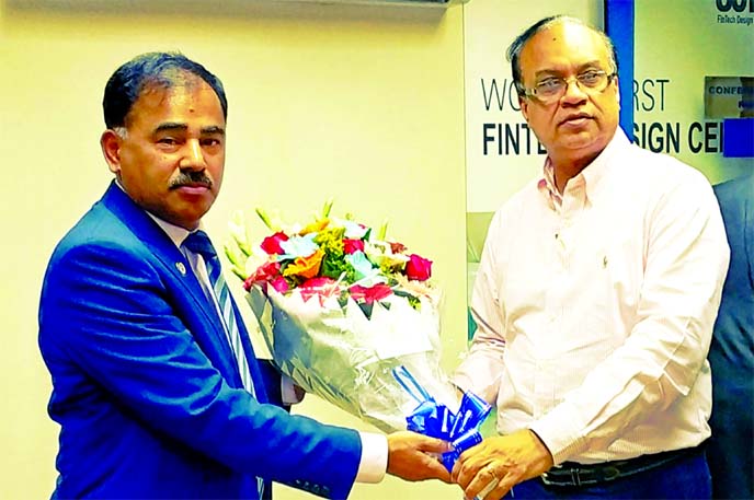 Vishwanath Prabhu, outgoing Chairman of Sonali Intellect Limited, greets Md. Ataur Rahman Prodhan, newly appointed chairman of the company at its 19th Board Meeting in the city recently. Sonali Intellect Limtied provides cutting edge financial technology