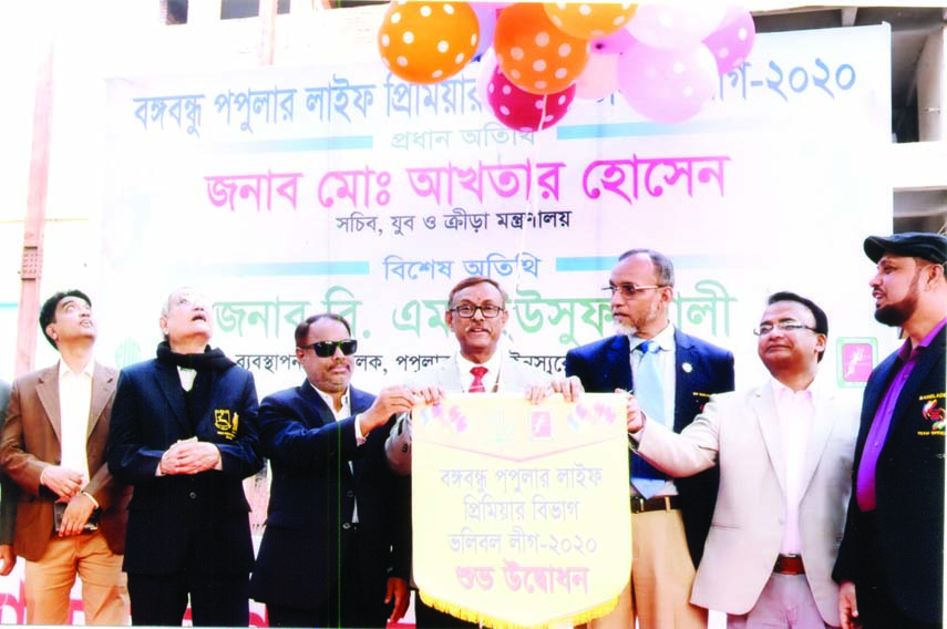 Secretary of the Ministry of Youth and Sports M Akhter Hossain inaugurating the Bangabandhu Popular Life Premier Division Volleyball League by releasing the balloons as the chief guest at the Shaheed Nur Hossain Volleyball Stadium on Wednesday. Managing