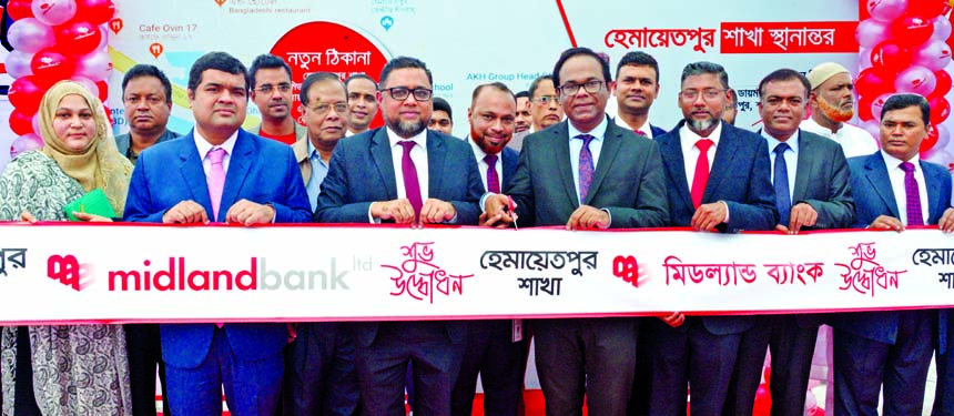 Md. Zahid Hossain, Head of Corporate Banking Division of Midland Bank Limited, inaugurating its relocated Hemayetpur Branch at Singair Road in Hemayetpur in Savar recently. Md. Ridwanul Haque, Head of Retail Distributions of the bank and local elites were