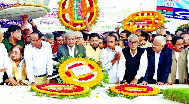 BNP Secretary General Mirza Fakhrul Islam Alamgir alongwith other leaders placing wreaths at the grave of founder of BNP and former president Ziaur Rahman marking his 84th birth anniversary yesterday .